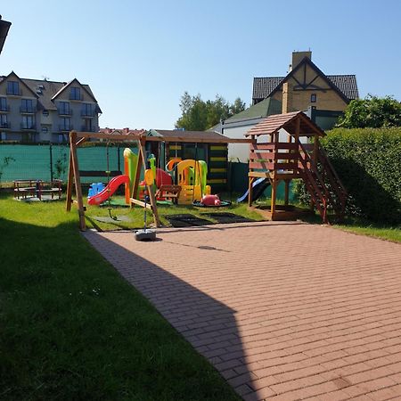 Apartamentowe Domki Drewniane Colorado Karwia Exterior foto