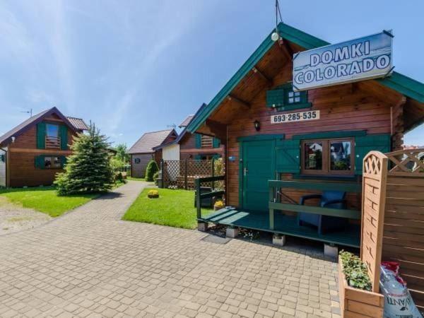Apartamentowe Domki Drewniane Colorado Karwia Exterior foto